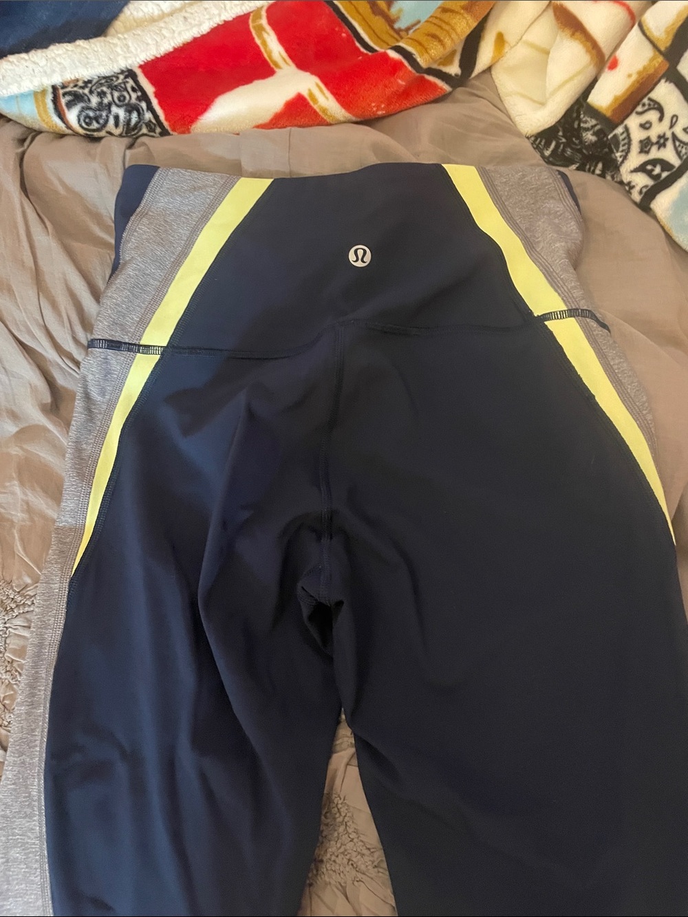 lululemon navy athletic leggings with silver logo dot